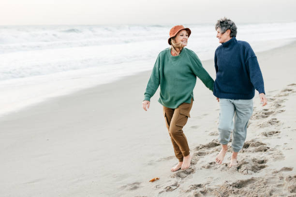 istock Senior couple on the beach 1402904570