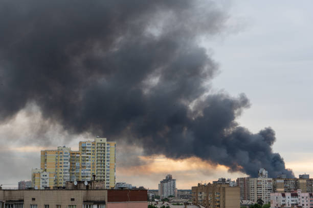 istock Thick smoke in the clouds, fire in city. 1402907150