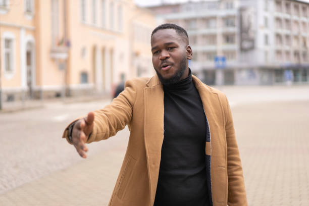 istock A man with his hands out ready to greet a friend 1402907386