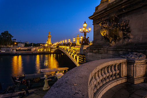 The Alexander III bridge illuminated at the blue hour. Photo taken on 25th of April 2022 in Paris, France.