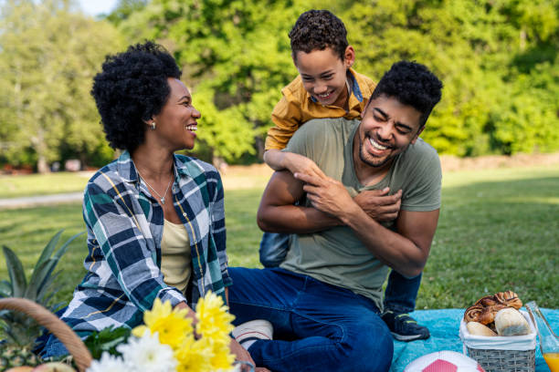 istock Happy family spending a spring day on picnic 1402911958