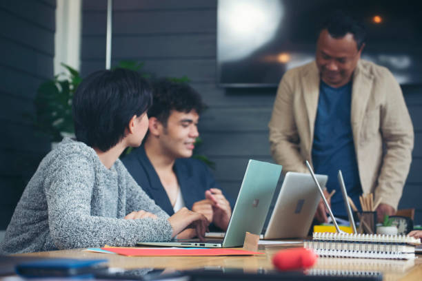 istock Group of business people plan annual budget report and work to solution strategy during brainstorming meeting. Collaborate of Professional Businessman and team at office. Strategy Business concept. 1402912651