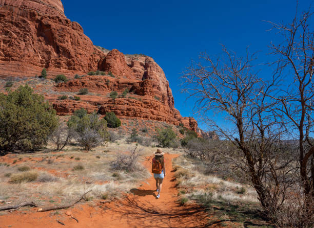 istock Girl on spring hiking trip in red mountains. 1402913041