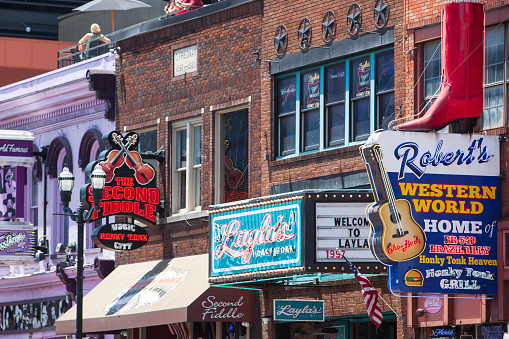 Robert's Western World, Layla's Honky Tonk and The Second Fiddle sign on Broadway in Nashville, Tennessee on May 30th, 2022.\