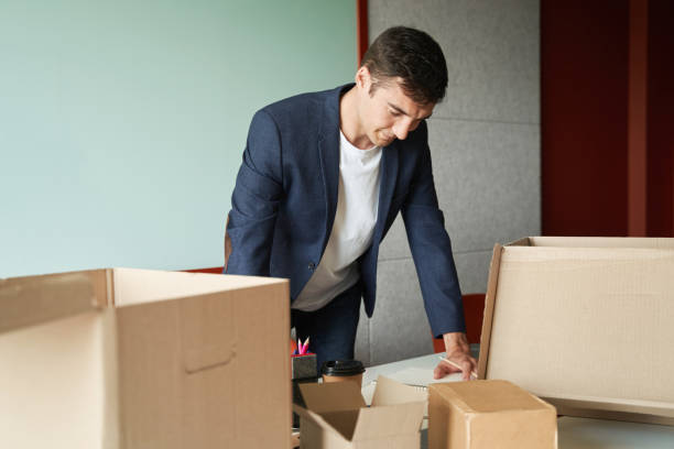 istock Company employee consulting with notebook about delivery 1402914558