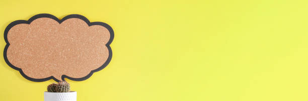 istock plant with blank sign on yellow background. copy space, advertisement, presentation. New ideas, creativity and think out of the box concept. banner 1402915160