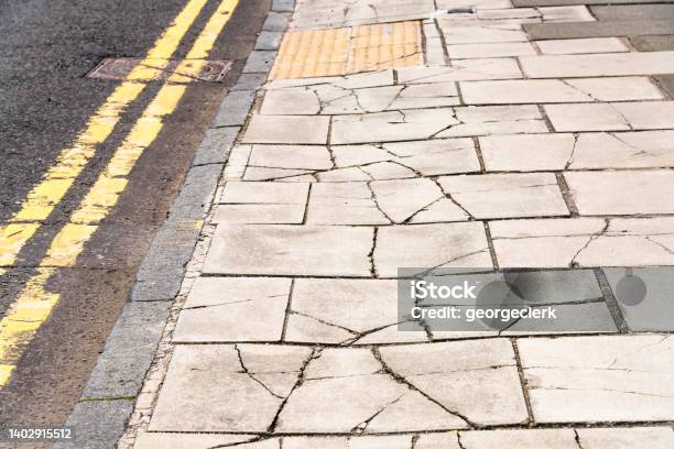 Heavily Damaged Pavement Stock Photo - Download Image Now - Antique, Asphalt, At The Edge Of