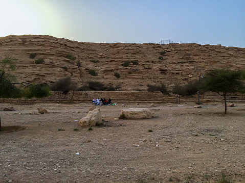 Riyadh, Saudi Arabia, February 2oth, 2015: Families having a picnic at a wadi in the outskirts of Riyadh, Saudi Arabia.