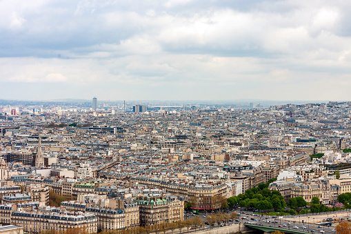 Montparnasse Tower, Madeleine Church and Eiffel Tower in stormy weather in Paris in summer