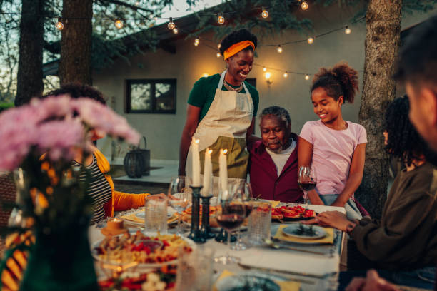 istock Friends and family having a dinner party 1402917000
