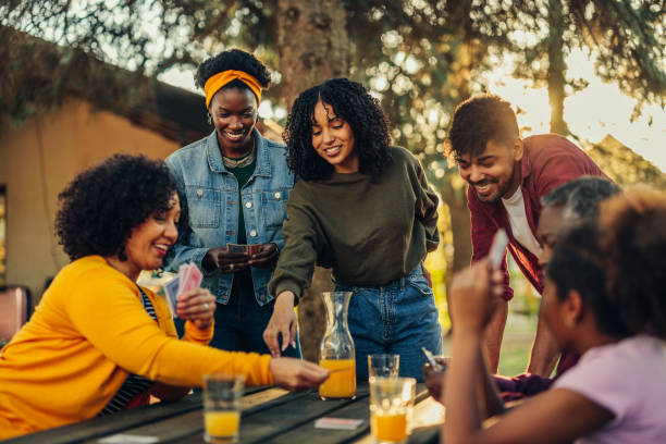 istock Family playing board game together 1402918439
