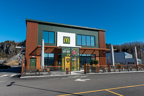 Bamble, Norway - April 15 2022: Exterior of McDonalds restaurant at Rugtvedt