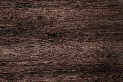 Dark wood texture background directly above