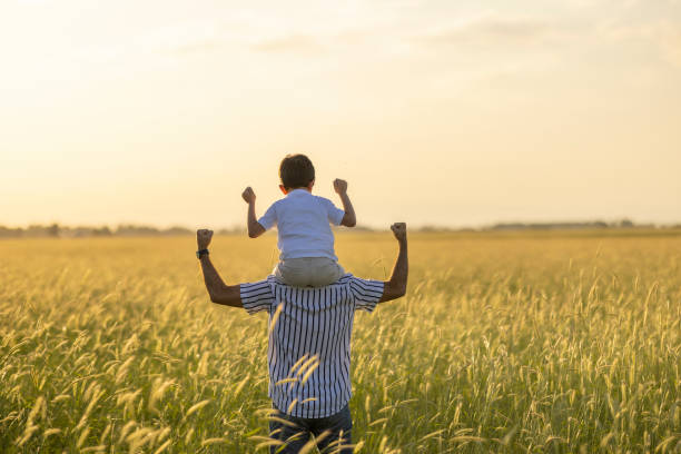 istock Dad and son outdoors 1402927736