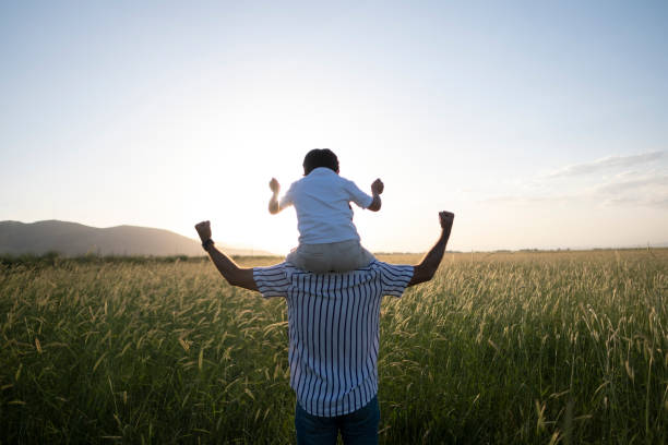 istock Dad and son outdoors 1402928520