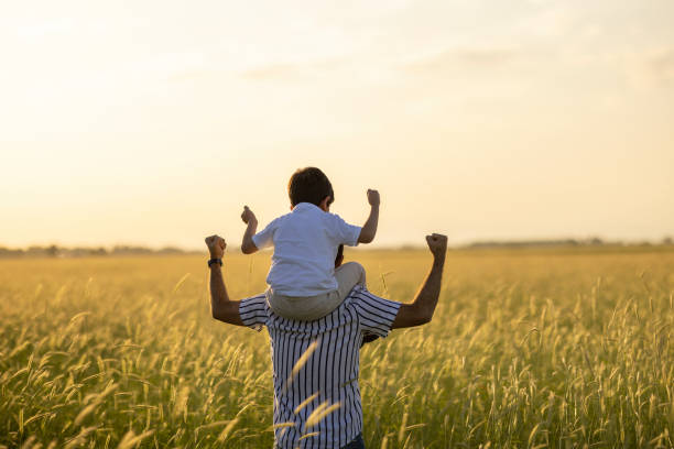 istock Dad and son outdoors 1402928897