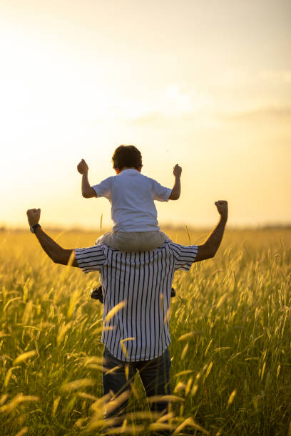 istock Dad and son outdoors 1402928983