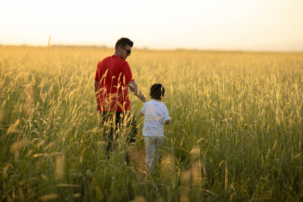 istock Dad and son outdoors 1402929272