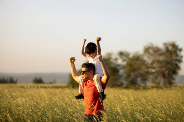 istock Dad and son outdoors 1402929275