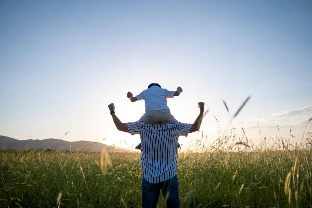 istock Dad and son outdoors 1402929327
