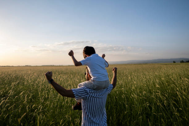 istock Dad and son outdoors 1402929349