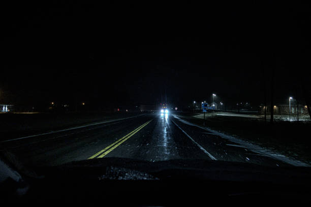 istock Trailer Truck Turning Onto Dark Highway Up Ahead 1402929568