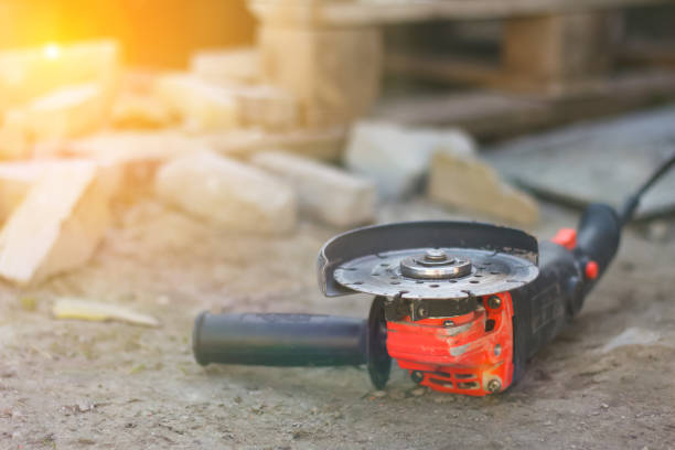 Defocus angle grinder. Tool for construction industry. Copy space. Construction design backdrop. Blurred grinder. Orange flare. Grinding. Improvement home. DIY. Work tool. Out of focus Defocus angle grinder. Tool for construction industry. Copy space. Construction design backdrop. Blurred grinder. Orange flare. Grinding. Improvement home. DIY. Work tool. Out of focus. grinding metal power work tool stock pictures, royalty-free photos & images