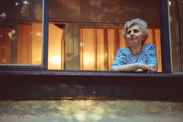 istock Old woman spends time alone 1402935803