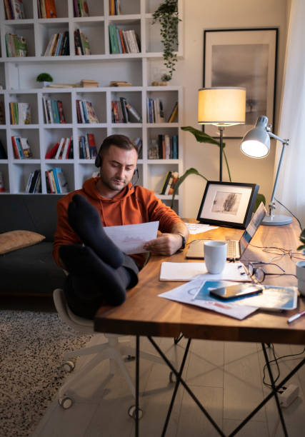 istock Man working on laptop at home 1402941541