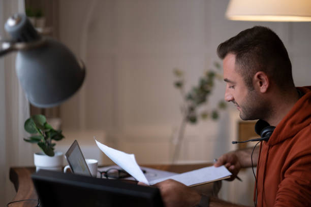 istock Man working on laptop at home 1402941768