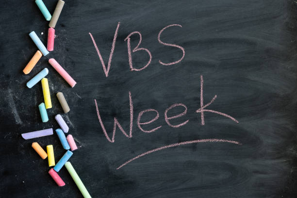 Chalkboard with words VBS Week written on it stock photo