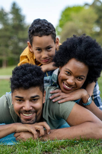 istock Happy family spending a spring day on picnic 1402944675