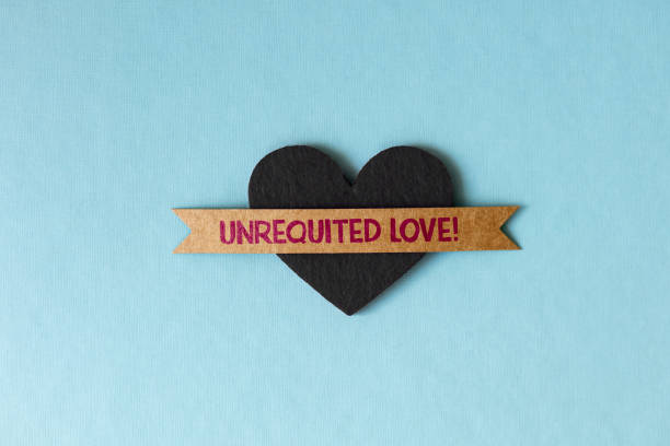 istock Unrequited love with black heart shape 1402946833