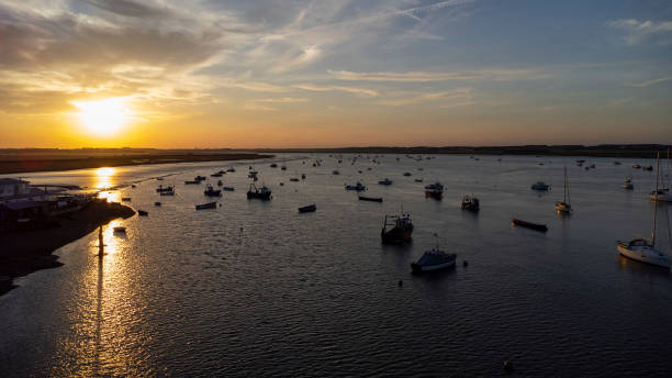 istock Small boats basking in the sun 1402953036