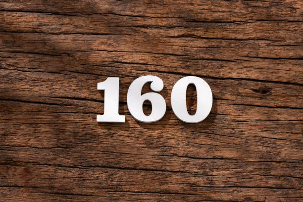 istock Number 160 - piece on rustic wood background 1402953140
