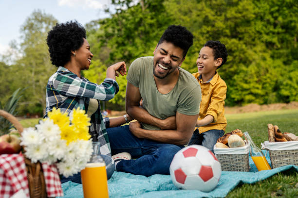 istock Happy family spending a spring day on picnic 1402955351
