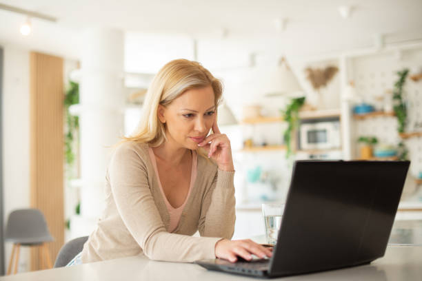 istock Businesswoman looking busy working from home 1402959757