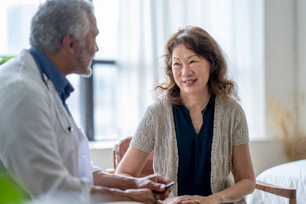 istock Homecare Visit with a Patient 1402962426