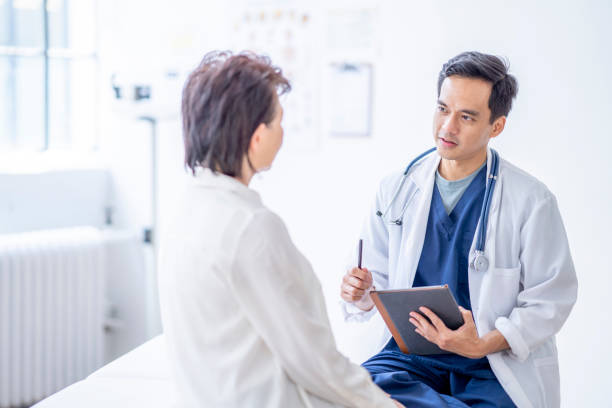 istock Doctor Meeting with a Senior 1402980608