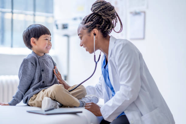 istock Listening to a Little Boys Heart 1402980629