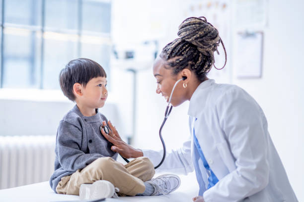 istock Listening to a Little Boys Heart 1402980641