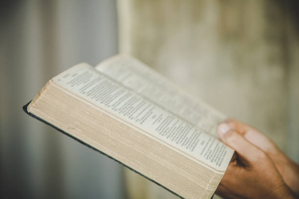 istock woman with bible 1402980913