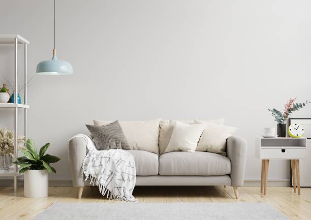 istock White minimalist interior living room have sofa and decoration. 1402983462