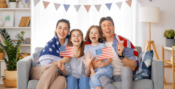 istock Family with American flag 1402984812