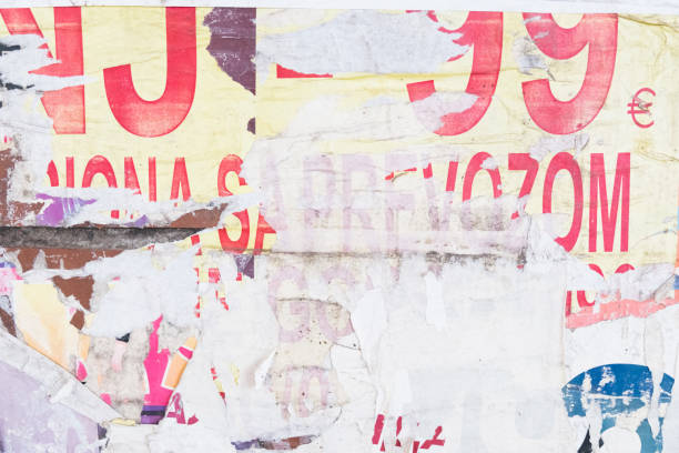 istock Torn street poster background, abstract weathered paper collage with random text and numbers 1402984833
