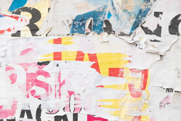 istock Torn street poster background, abstract weathered paper collage with random text 1402984858