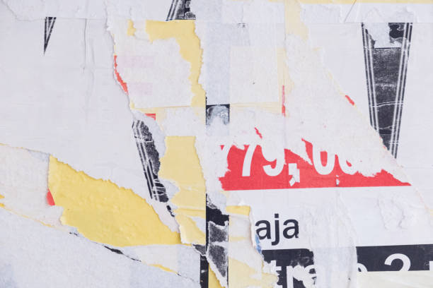 istock Torn street poster background, abstract weathered paper collage with random text and numbers 1402984874