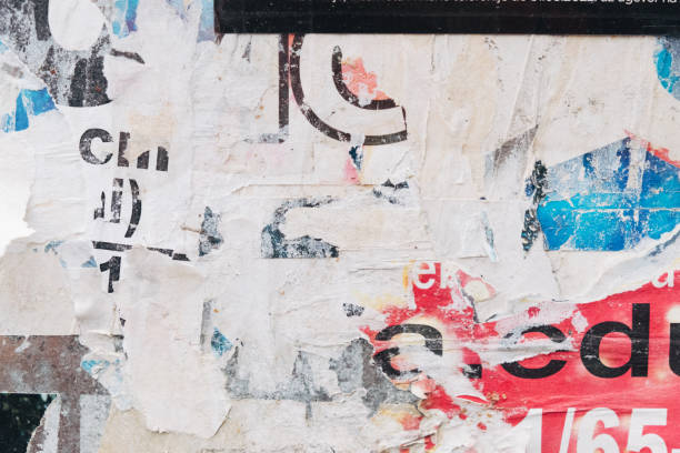 istock Torn and old street poster background, abstract paper collage texture 1402986319