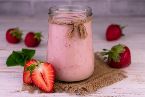 istock Strawberry banana smoothie in a jar.Close-up. 1402987230