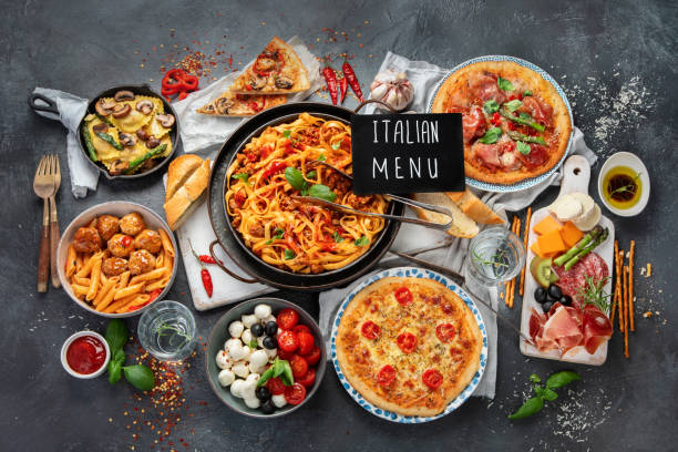istock Italian food assortment on dark background. 1402989643